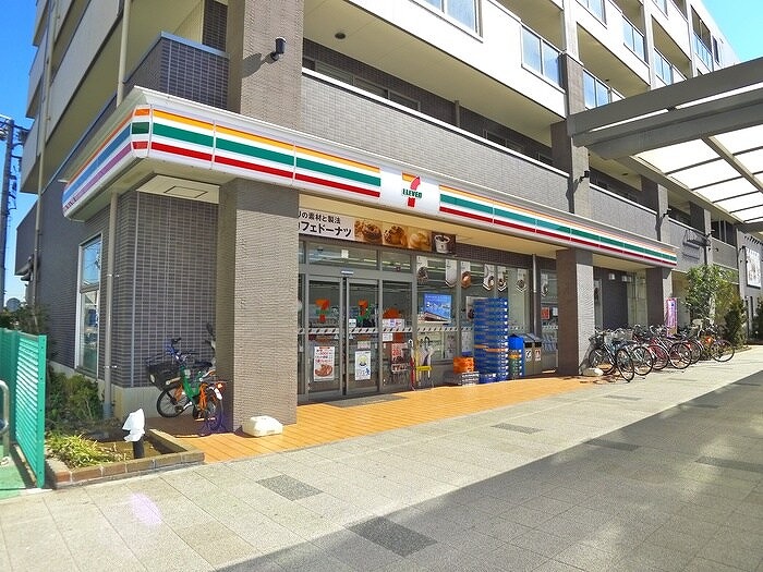 ミリアビタ飯山満 コンビ二：セブンイレブン　飯山満駅前店　385m
